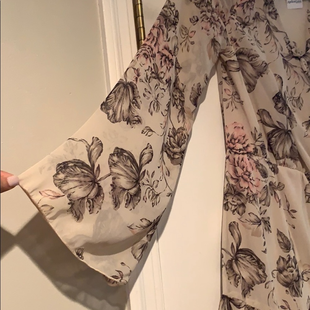 NWT. Floral and flowy romper. - Picture 2 of 6